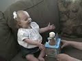 mara kate playing with her jack-in-the-box.