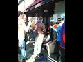 Klezmer in front of Saul's deli on Xmas