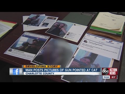 Disturbing photo shows Fla. man pointing gun at cat