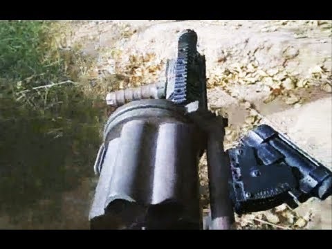 firing - U.S. Marines battling Taliban in Marjah, Helmand Province, Afghanistan, employ the M-32 semi automatic grenade launcher to suppress enemy forces firing from ...