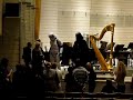 stormtrooper surrounded by fans after great atso almila concert of star wars classics.
