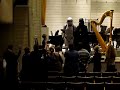 stormtrooper surrounded by fans after great atso almila concert of star wars classics.