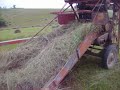 Allis Chalmers Roto Baler in action Allis Chalmers Roto Baler in action