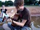 Chad Sugg of Backseat Goodbye singing his pretty little songs on a dock a few feet from me. he breaks a string, and video is cut short, but he's a cutie.