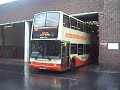 Buses leave Hove bus station on a wet summer Sunday morning