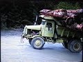 ROCK TRUCK, 1954 EUCLID HAULING LOGS, BETTER QUALITY VERSION