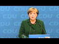 German Chancellor Angela Merkel welcomes Francois Hollande, warns Greece