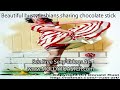 Beautiful busty lesbians sharing chocolate stick.mov