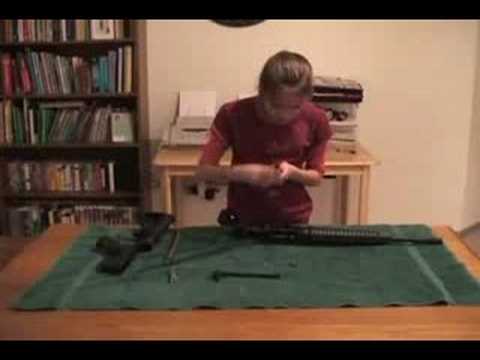 11 years girl assembles rifle