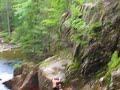 kyle and luke cliff jumping into smalls falls in central maine.