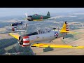 welcome, au depart de la ferte alais, de l'escadille des t6 harvard, ainsi que du p51 mustang et p40 curtiss, spitfire mk19, ad4 skyraider et du stinson, pour la fete aerienne de la faa organisee par bleu ciel airshow a  melun villaroche, avec ophelie winter et les pom pom girl du stade francais,
 bonne ambiance sur le parking, merci a tous et aux organisateurs..
the amicale jean-baptiste salis (ajbs), nammed after its founder (1896-1967), rebuilds and puts on display, in flight or on ground, some aircraft now belonging to the world heritage of flying machines. ajbs is located on the cerny-la fert� alais airfield, some 30 miles south of paris. besides the fact that this is a museum with some venerable flying machines, a large part of the aircraft are maintained to flying conditions and are frequently displayed in airshows all over france during the flying season. the amicale is most well-known for its yearly airshow (always during whit sunday week-end), where dozens of aircraft, from all ages and all origins, and thousands of people (from all ages and all origins too !) are gathered. the amicale jean-baptiste salis (ajbs), nammed after its founder (1896-1967), rebuilds and puts on display, in flight or on ground, some aircraft now belonging to the world heritage of flying machines.
the t-6 texan was a single-engine advanced trainer aircraft designed by north american aviation, used to train fighter pilots of the united states army air forces, united states navy, royal air force and other air forces of the british commonwealth during world war ii. the t-6 is known by a variety of designations depending on the model and operating air force. the usaac called it the 
