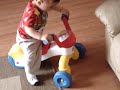 baby Nathan with his \"motoca\"...