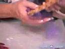 Arts & Crafts: How to Make Pretzel Crafts : How to Make a Red Hat Wreath With Pretzels Arts & Crafts: How to Make Pretzel Crafts : How to Make a Red Hat Wreath With Pretzels