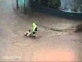 Woman Slams Head Into Pole On Flooded Street