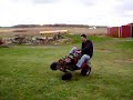 Riding race mower on 2 wheels