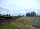 DXR 8007 climbs away from Kereone with an empty Metroport train for Tauranga.
