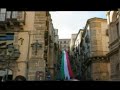 CALTAGIRONE:BANDIERA DA GIUNNES RICOPRE LA SCALA  SANTA MARIA DEL MONTE