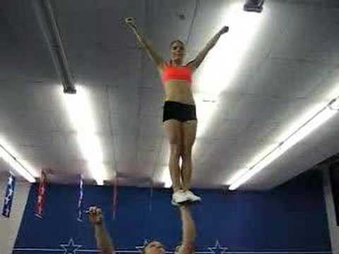 STUNTS - An awesome video of some incredible stunts performed by King and Katie. The stunt, a full-up to stretch, involves Katie (the flyer) balancing upright on King...