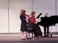Elizabeth playing violin at her honor recital