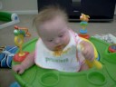 Seana Trying to Feed Herself