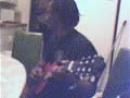 Jean Robert Bonjean playing the guitar