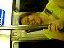 Lydia licks the metro pole