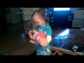 Maelynn putting her baby Chloe to sleep...