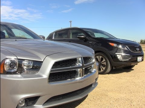 2011 Dodge Charger vs KIA Sportage Mashup Drag Race 2011 Dodge Charger vs KIA Sportage Mashup Drag Race