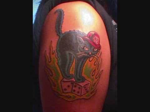 Cat Tattoos Designs. Visit www.findtattoodesigns.com for more tattoos,