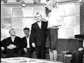 slovak model adriana sklenarikova (185 cm) demonstrates her height in a french television show. mute. poor quality. a boomlang production.