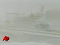 A winter storm has blanketed the Texas Panhandle. It was whiteout conditions at Amarillo Airport, where visibility was near zero. Driving winds and snow whipped the runways. (March 27)