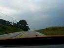 Speeding in the orange Mustang