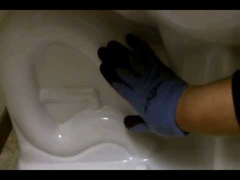 how to use an auger to unclog a toilet