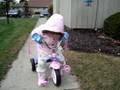 Sophia riding her bike
