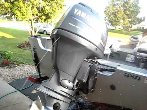 how to unclog outboard motor