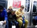 Fashion designer on New York subway Fashion designer on New York subway