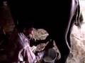 Milking — and befriending — a buffalo in India