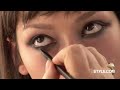 runway, backstage, and front-row footage from the show.