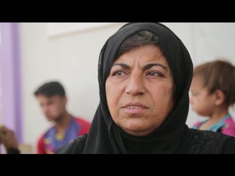 العراق: عائلة من 12 فرداً تغادر الموصل هرباً من القتال