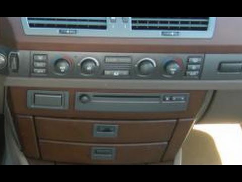 How to Remove Radio / CD Player from 2006 BMW 750i for Repair.