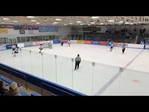 Rocco Geisler scores a goal against Chaska Chan with 1.4 seconds left in the 2nd period to go up 4-1