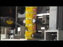 Shrink Labeling machine, for label cutting, inserting and shrinking full automatically.