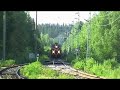 Freight train 5064 passes Suhonen level crossing