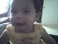 eating a peach, but it was sour!!