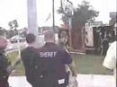 16 year old arrested for holding a \"F*ck Bush\" sign