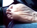 Bare male feet fooling around in the ride Bare male feet fooling around in the ride