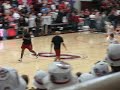 Stanford football players playing basketball at halftime