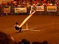 Couple of cowboys on a teeter totter dodge a bull at Midwest Horse Fair 2008.Doesn't last too long but fun to watch.