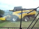 John Deere 9680 WTS a New Holland CX 860