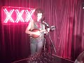martha-polly barton plays her mandolin at the vitamin water XXX berry factor final